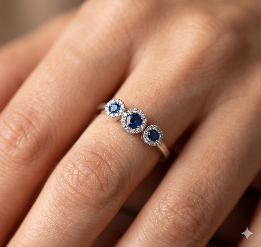 Anello Donna in Oro 18 Carati con Diamanti e Zaffiri.
